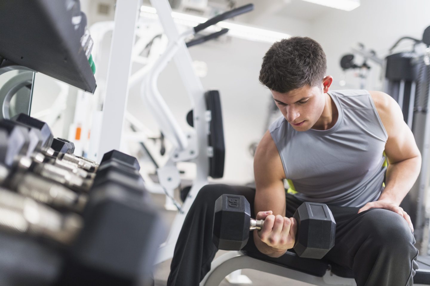 The exact amount of time you need to lift weights to see muscle gains, according to research